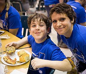 NMC nursing student Amanda Harvey and her son at the Minne Lusa Health Carnival.