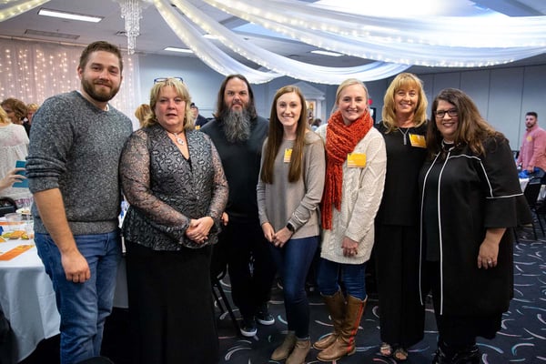 Wren and Stephanie Pettett, Justin Singer, 2018 NMC MOT grads Melissa Doerr and Kaitlin Johnson, NMC President/CEO Deb Carlson, Michelle Massey.