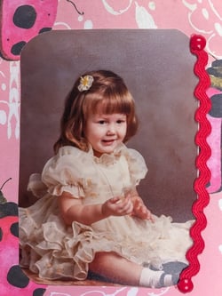 Ladybug scrapbook photo of Cheyla Pettett as a child.