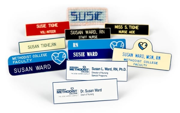 Image of 10 Methodist ID badges worn by Susie Ward over the years, from volunteer Candy Striper to Dean of Nursing.