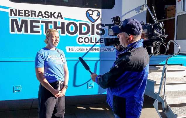 KETV reporter interviews Dr. Sisson on-camera in front of Mobile Diabetes Center. 
