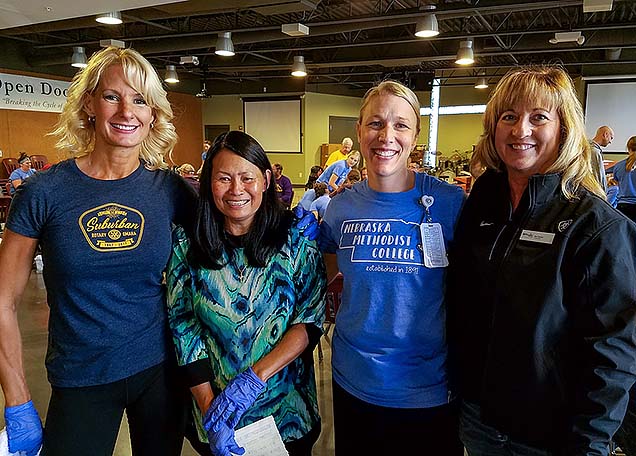 Holly Hollenbeck, Jenny Johnson, Jillian Sisson, Deb Carlson. at the Foot Care Clinic for the Homeless.