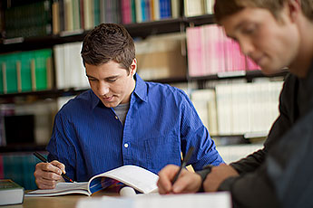 Studious nursing students in the library