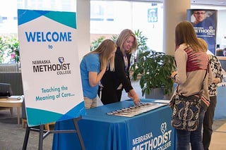 The welcome desk at one of Nebraska Methodist College's Visit Days