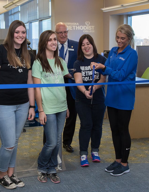 NMC students cutting the ribbon to open the new Student Engagement Center