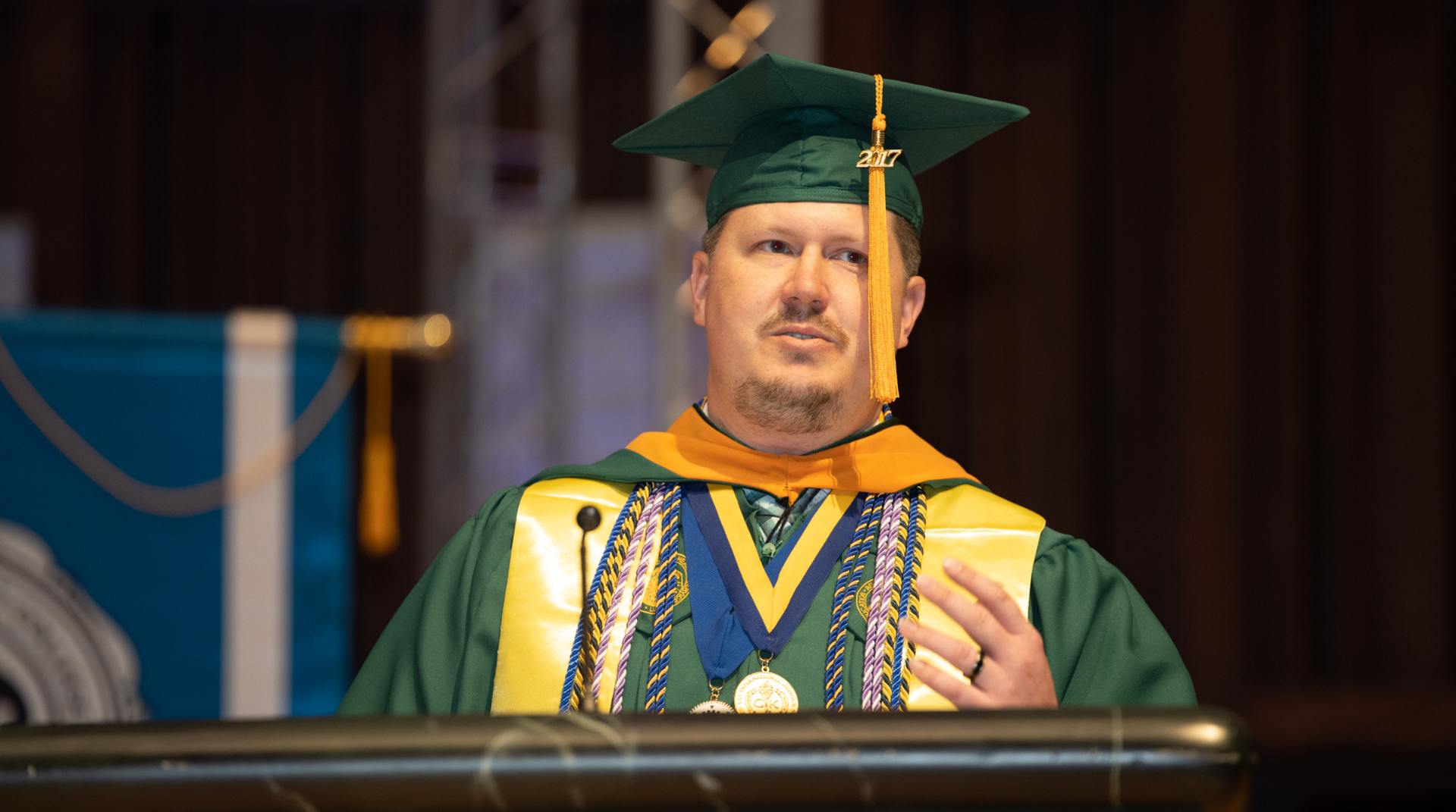 Nebraska Methodist College alum Blake Smith speaks at commencement in Spring 2022.