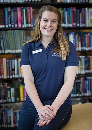 Lauren, a Nebraska Methodist College nursing student wearing an NMC Ambassador shirt