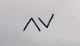 Maddie's Tattoo Symbol, similar to arrow tips, one pointing upward and one pointing downward