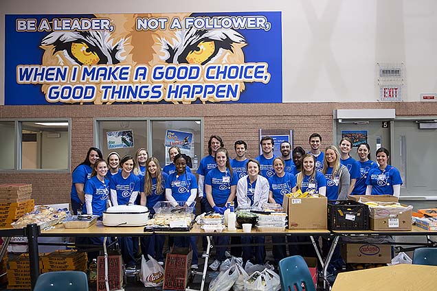 These NMC nursing students are ready to serve a free hot meal to students and families at the Minne Lusa Health Carnival.