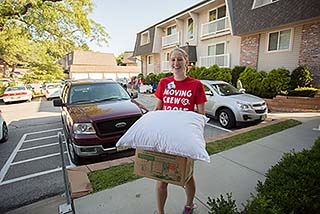 Student Moving Into A Dorm