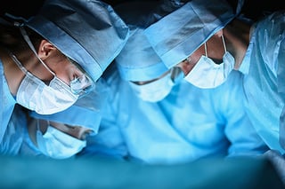 Surgical tech team in surgery