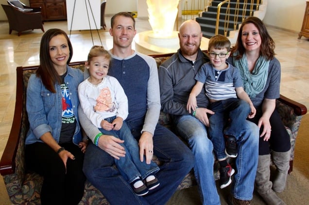 The Masters and Reisdorff families pose for a photo together.