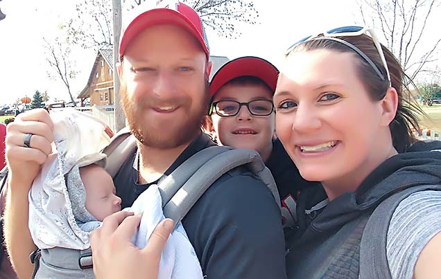 Christa & Joe Reisdorff with sons Truman and Macklin.