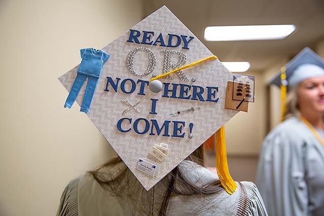 A graduate's cap reads: "Ready O.R. Not, Here I Come!"