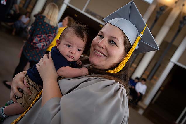 New NMC graduate with her new baby.
