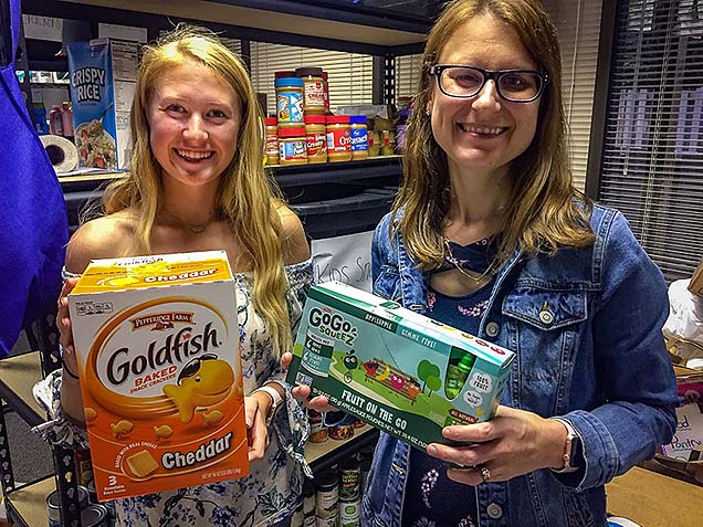 Methodist Volunteen Megan Jacobsen and Dr. Lisa Johnson at the NMC Food Pantry.