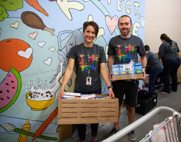 NMC faculty and staff volunteering at the Heart Ministry Center's food pantry.