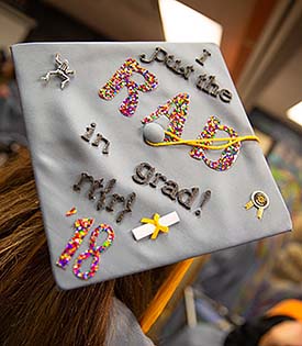Image of a personally decorated cap of an NMC rad tech grad