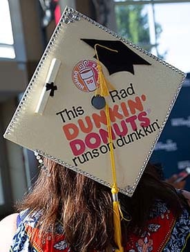 Image of a decorated cap at NMC summer commencement 2018