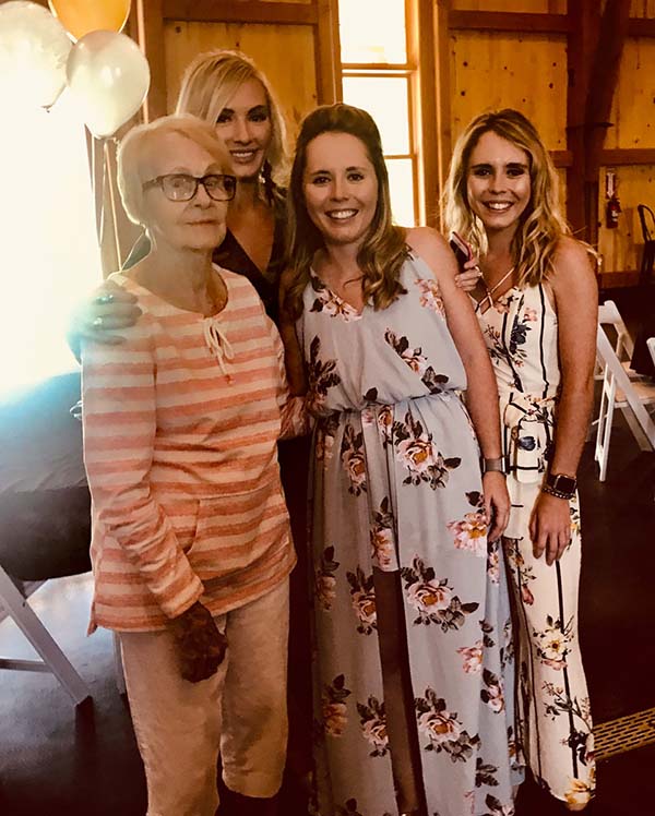 The three Rodgers sisters -- Betsy, Jane and Annie -- post with their grandmother, Kathryn Pfeiffer, at her 90th birthday celebration.