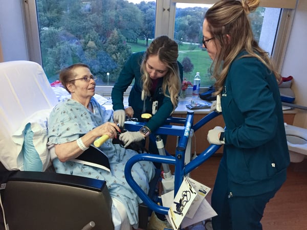 Leona Anderson receives care from Annie and Jane Rodgers.