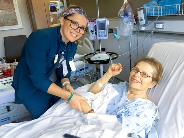 Jane providing care at the bedside for Leona Anderson.