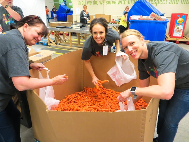 NMC faculty and staff volunteer at the Food Bank for the Heartland. 