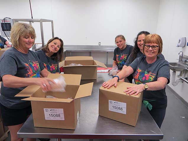 Volunteering at Food Bank of the Heartland. 