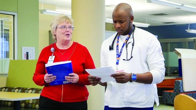 Maurice "Mo" Gregory III, pictured here with Dr. Susie Ward, took several detours on the way to finding his place in the healthcare community.