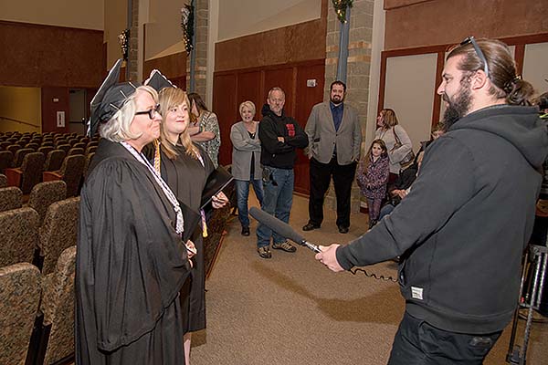 KMTV Channel 3 reporter interviews Lisa and Cassandra Kessler.