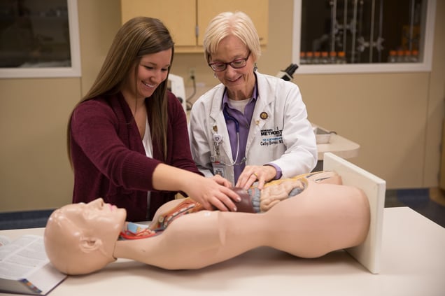 Taylor Kolvek (left) graduated in May with her BSN from Nebraska Methodist College.