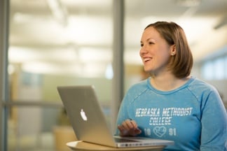 Medical Assistant studying on her computer